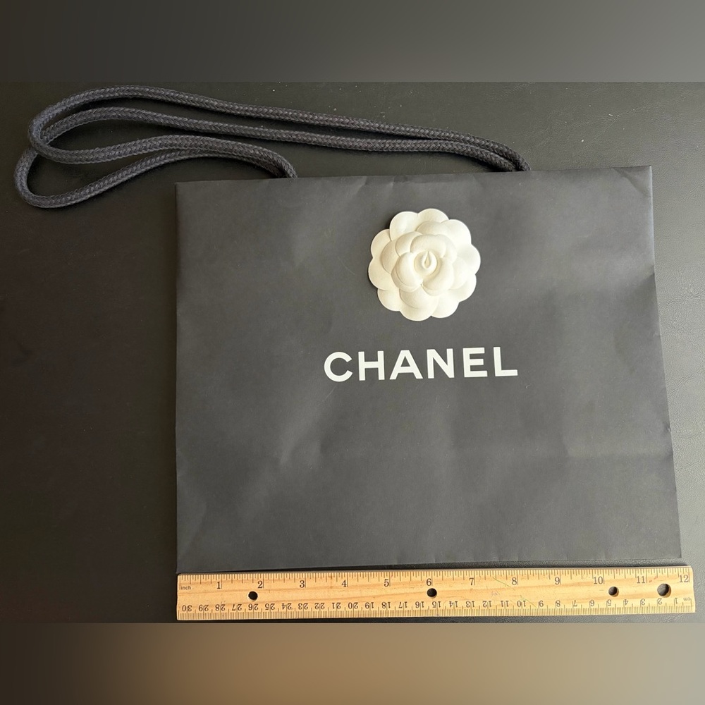 CHANEL Black Bag with White Camellia